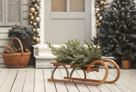 House christmas retro decorations in gold and silver colors. Sled with tree House christmas retro decorations in gold and silver colors. Sled with tree